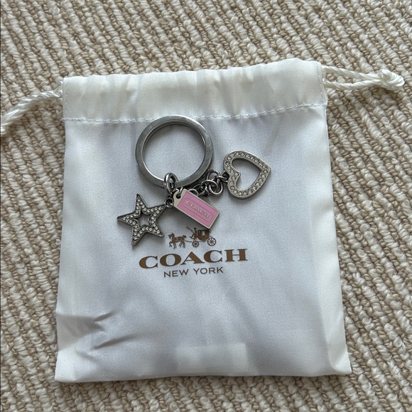 Coach Accessories - Coach Silver and Pink Charm Key Holder Comes with Jewelry care booklet and pouch
